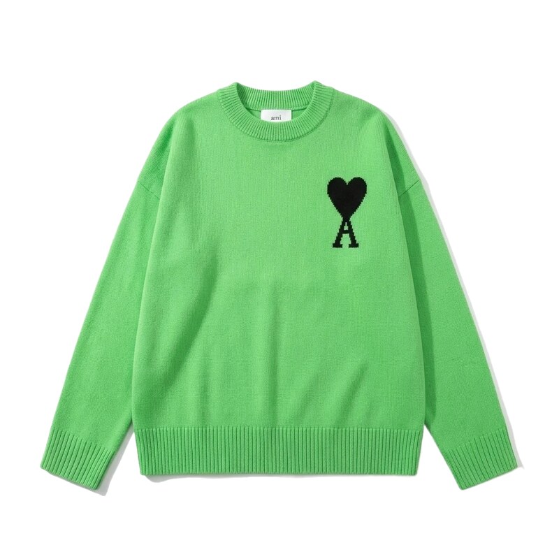 AMIRI's trendy and cool green sweater with a heart pattern.