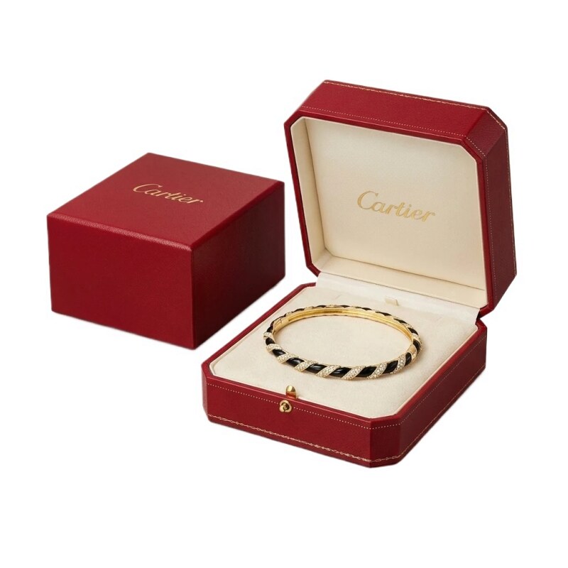 Cartier's classic black and gold bracelet