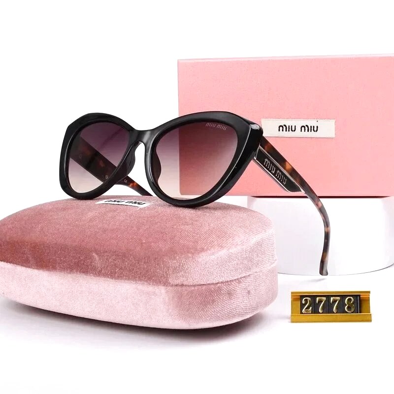Miu Miu Casual Oversized sunglasses Black Oval Sunglasses for Streetwear Looks