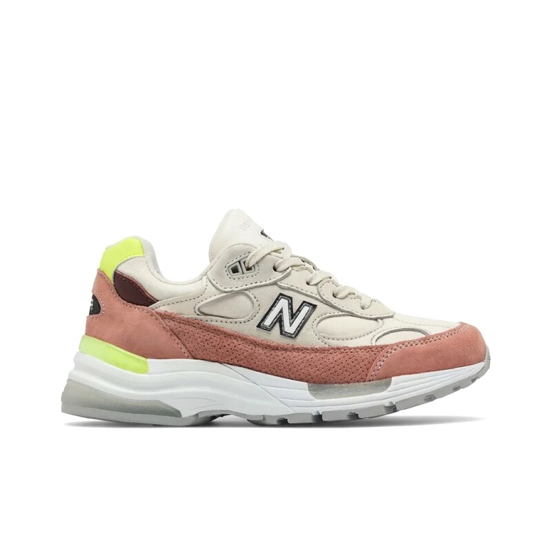 New Balance retro-style pink and white sports shoes