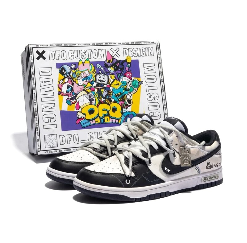 Nike black and white graffiti-style skate shoes