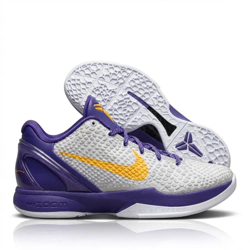 Nike Kobe series purple and white sports shoes.