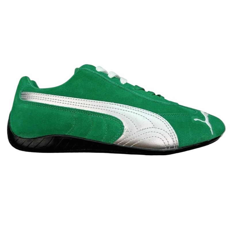 PUMA green and white retro-style sneakers