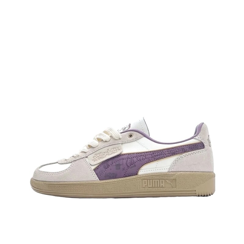 PUMA retro-style purple and white sports shoes