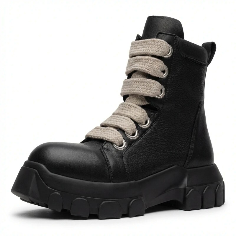 Rick Owens' dark functional style black boots.