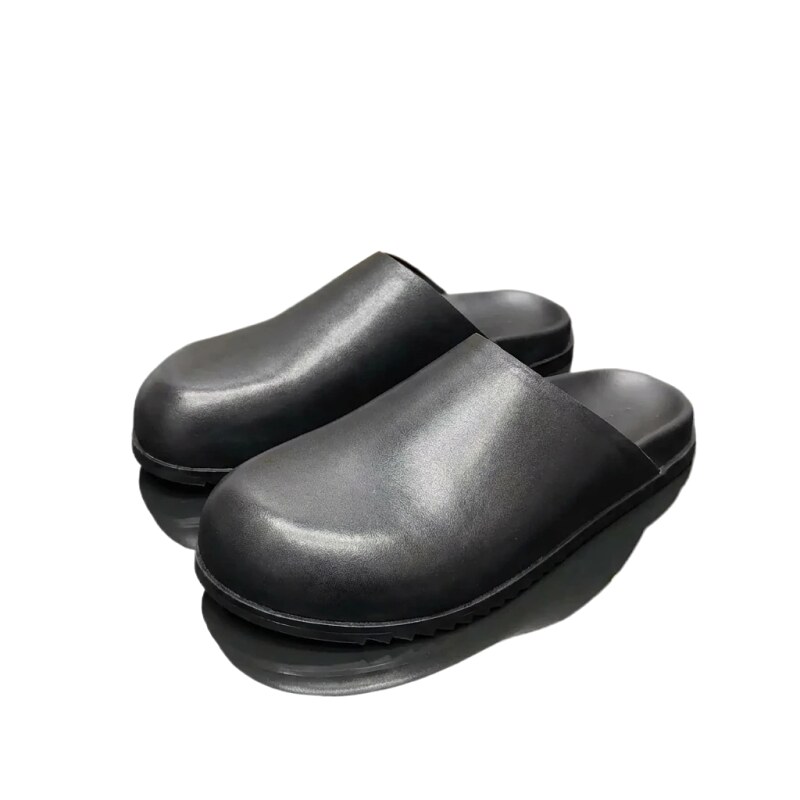 Rick Owens' dark style black slippers