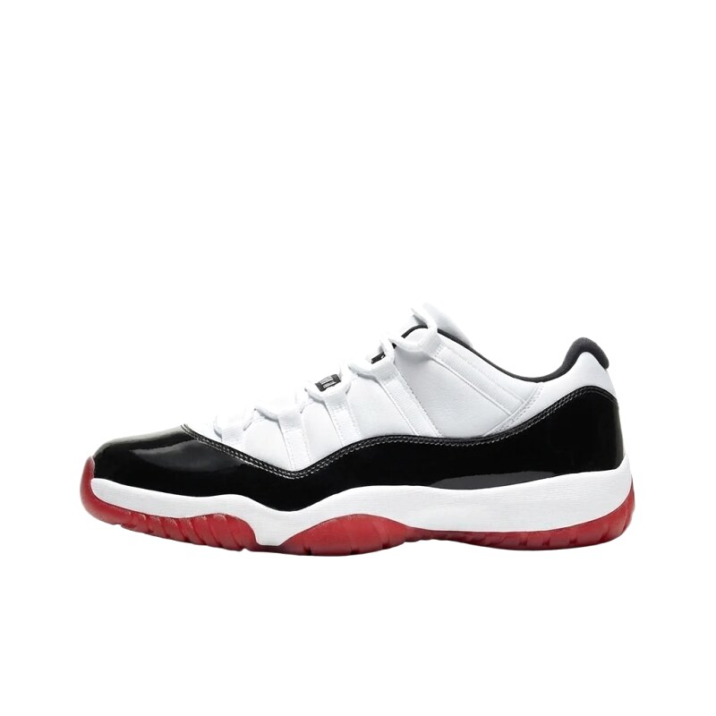 The black, white and red Jordan 11 trendy shoes.