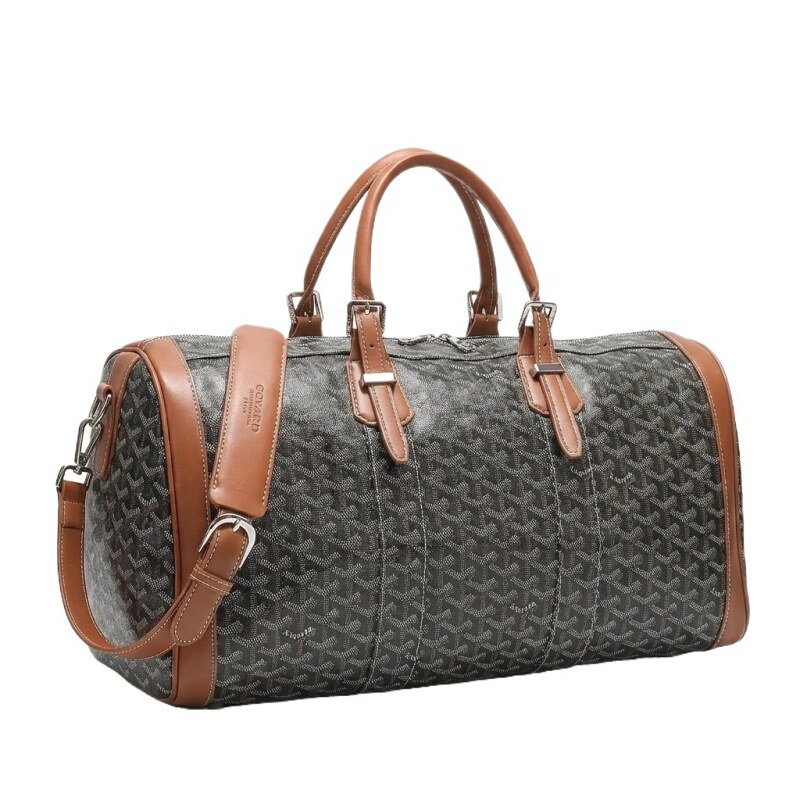 The classic brown-gray style of GOYARD travel bags.